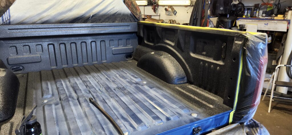 spray on box liner